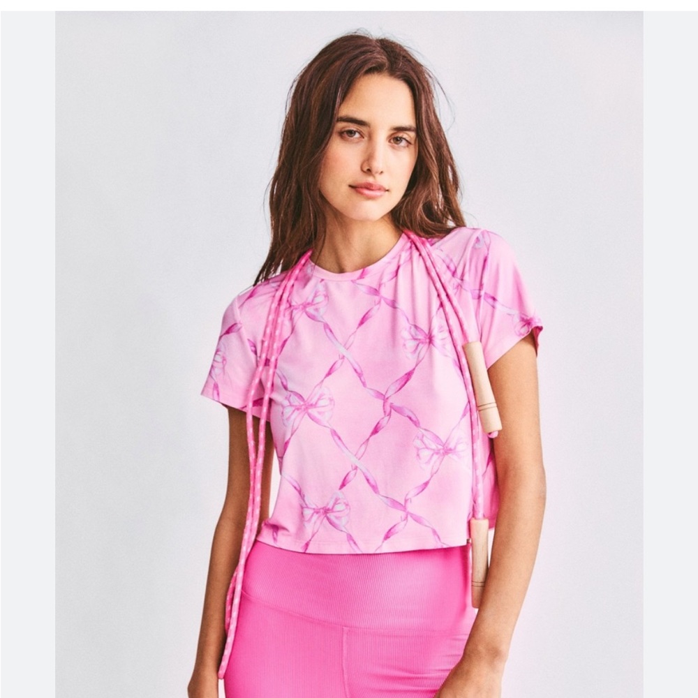 LoveShackFancy X BEACH RIOT size L pink bow crop workout top